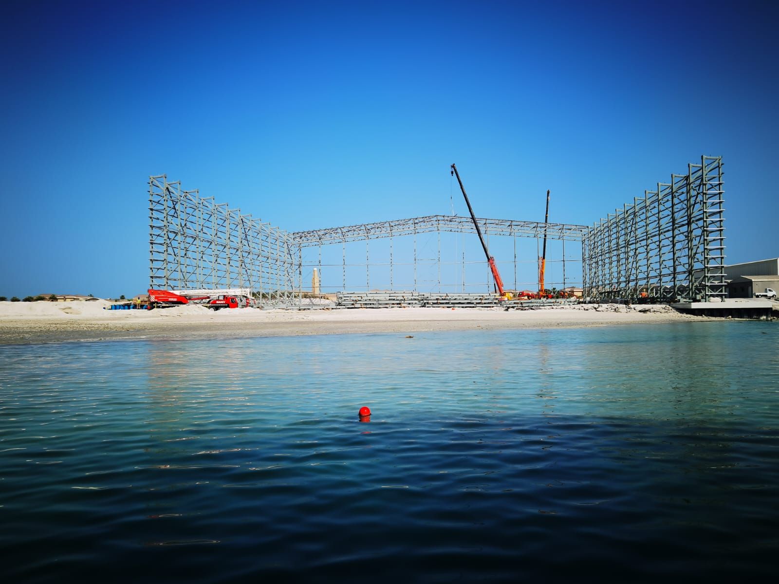 Marine works on the waterfront: steel structure over the water with our crawler cranes