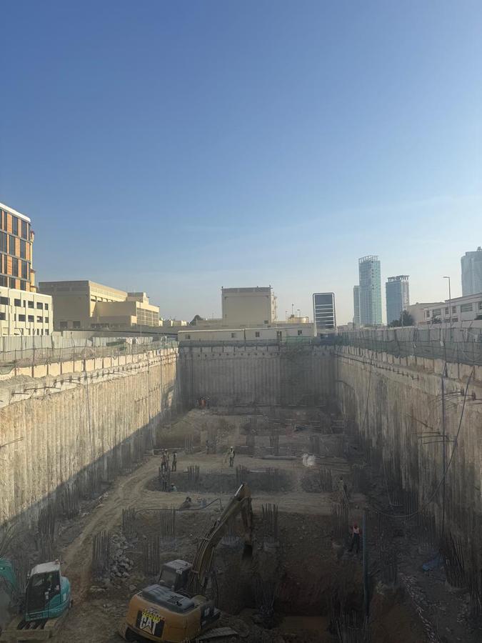 Secant-pile walls around a deep excavation